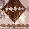 artisan-handwoven-moroccan-tribal-rug Close-up of triangular tribal symbols at the top and bottom sections.