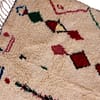 atlas-berber-handwoven-wool-carpet Side angle view of thick Berber rug highlighting its plush wool pile and texture.