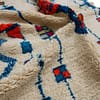 authentic-cream-blue-handwoven-moroccan-rug Handmade cream and blue Berber area rug texture detail