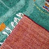authentic-moroccan-tribal-shag-rug Fringe detail showing hand-knotted tassels along the rug’s edge.