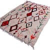 beni-ourain-style-cream-wool-rug Top view of cream tribal Moroccan area rug