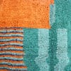 colorful-azilal-style-moroccan-area-rug Lower section view highlighting smaller diamond shapes and colorful triangular border accents.