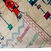 cream-blue-tribal-moroccan-wool-rug Geometric Berber rug in cream and blue close up