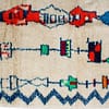 handmade-cream-blue-moroccan-area-rug Geometric Berber rug in cream and blue close up