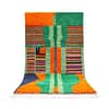 handmade-moroccan-berber-wool-rug-geometric Full front view of handmade Moroccan Berber wool rug with ivory base and colorful diamond geometric patterns.