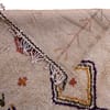 moroccan-wool-area-rug-ivory-with-colorful-motifs Corner detail showing plush high-pile wool and handcrafted weaving quality.