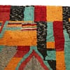 artisan-handwoven-moroccan-boho-rug Slight angled view highlighting thick high-pile texture and vibrant color blocks.