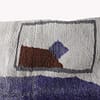 artisan-wool-rug-minimalist-abstract-design Center-focused view of the rug emphasizing the bold purple vertical design in the middle.