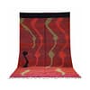 moroccan-berber-rug-red-green-abstract-wool Full view of a large Moroccan wool rug displayed against a white background with bold red, olive green, and black geometric designs.