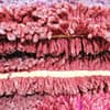 traditional-berber-wool-rug-colorful-design Detailed texture close-up of the soft wool pile and woven fibers of the Moroccan rug.