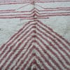 traditional-moroccan-handmade-rug Luxury handwoven Moroccan rug with V-shaped chevron patterns.