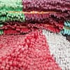 handmade-azilal-rug-berber-pattern-colorful-wool Partial close-up of rug pattern focusing on central shapes