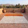 atlas-mountains-moroccan-wool-rug-orange-white-black-dots-artisan Orange & White Polka Dot Moroccan Rug | Handmade Berber Wool Rug | Boho Nursery , Living Room Decor