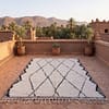 cream-moroccan-rug-handwoven-beni-ourain-carpet Handmade Ivory Black Geometric Berber Wool Rug – Moroccan Tribal Boho Statement Carpet