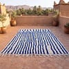 handmade-moroccan-rug-blue-line-wool-area-rug Contemporary Beni Ourain Rug – Luxury Moroccan Ivory Blue Stripe Area Rug