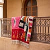 handmade-moroccan-tribal-rug-pink-red-orange-geometric-design Colorful Moroccan Azilal Rug | Handmade Abstract Berber Wool Rug | Boho Rainbow Area Rug | Tribal Handwoven Carpet | Eclectic Decor