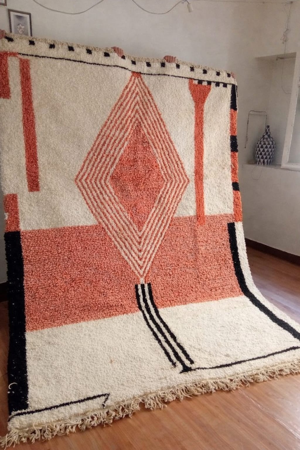 ChatGPT Image Jan 2, 2026, 09_41_02 PM Abstract Moroccan carpet with faded pink tones, central diamond motif, and black lines