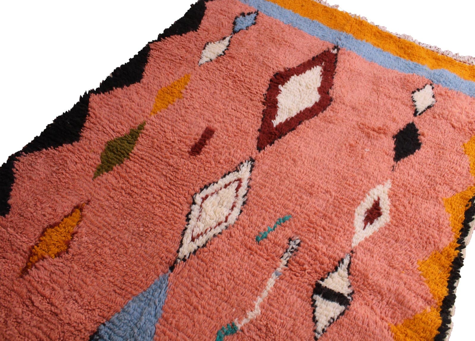 authentic-handwoven-berber-pink-rug Top-down view of a handmade coral Moroccan rug with colorful diamond designs.