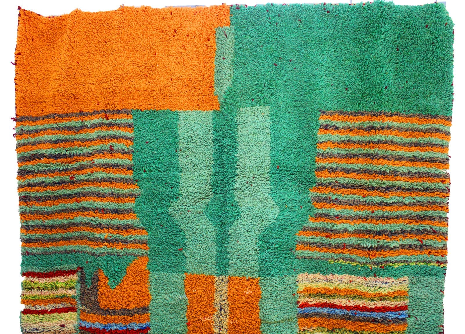 beni-ourain-inspired-geometric-rug Top section close-up showing upper green central motif with layered outlines.
