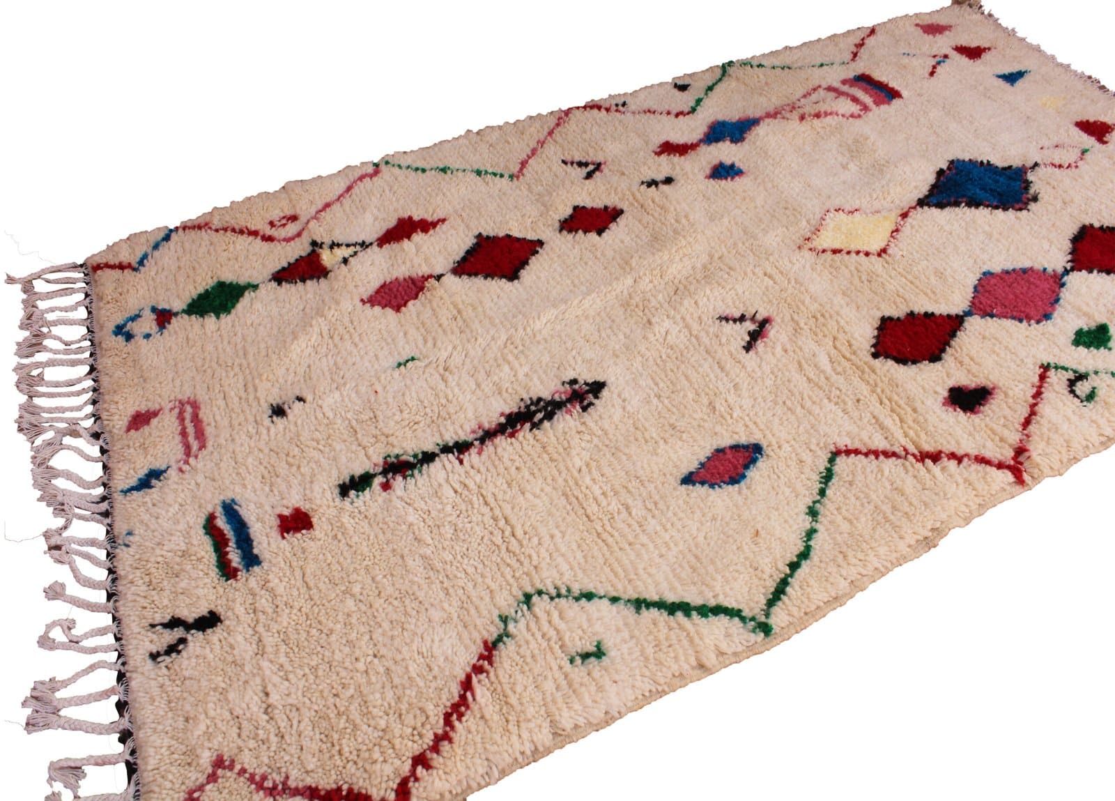 beni-ourain-style-geometric-area-rug Oblique side perspective showing thickness, softness, and colorful geometric design.