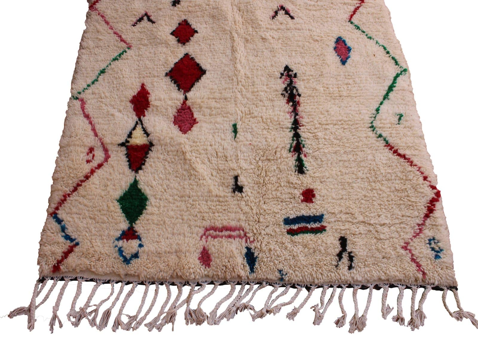 cream-berber-rug-with-colorful-pattern Bottom view showing handmade fringe detail and edge finishing of the Moroccan carpet.