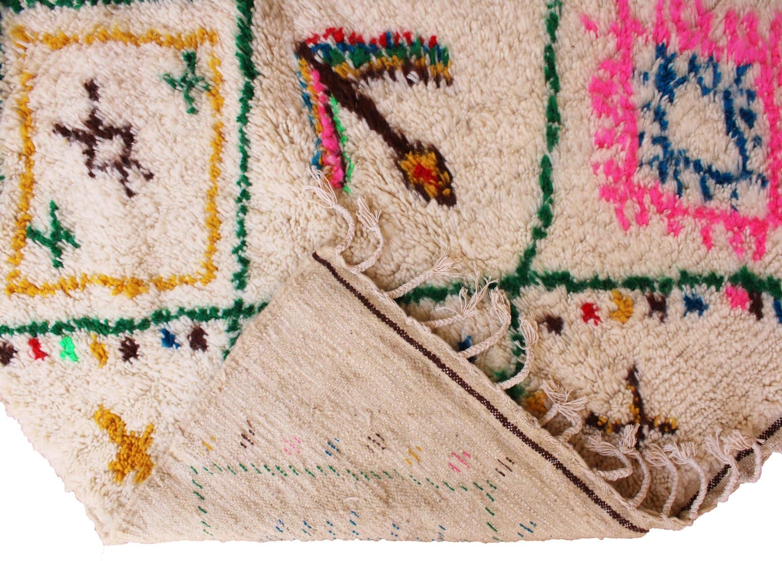 cream-moroccan-diamond-geometric-area-rug Angled perspective showing the geometric grid pattern and colorful accents.
