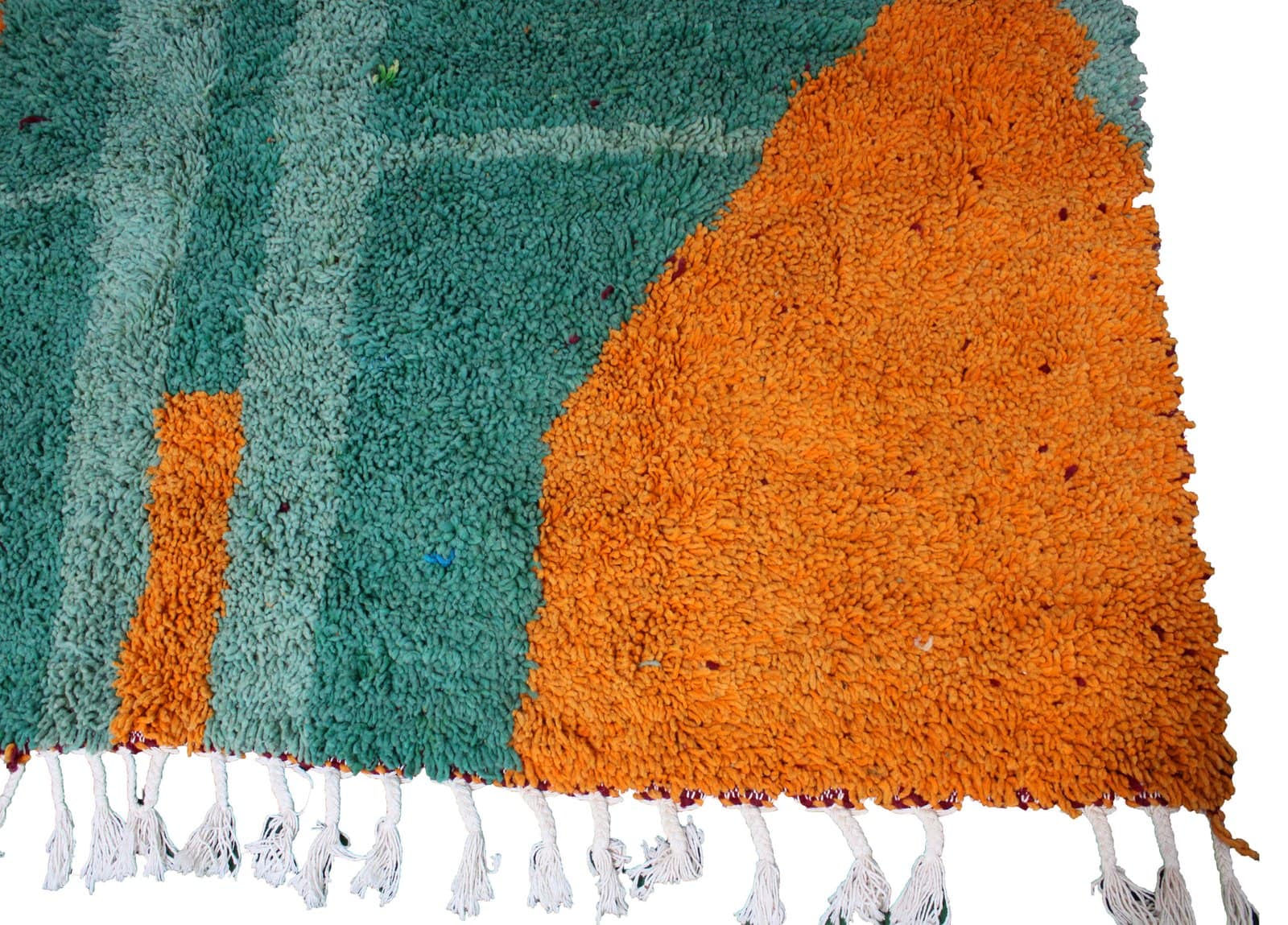moroccan-diamond-motif-tribal-carpet Bottom border close-up with orange, green, and black color blocks.