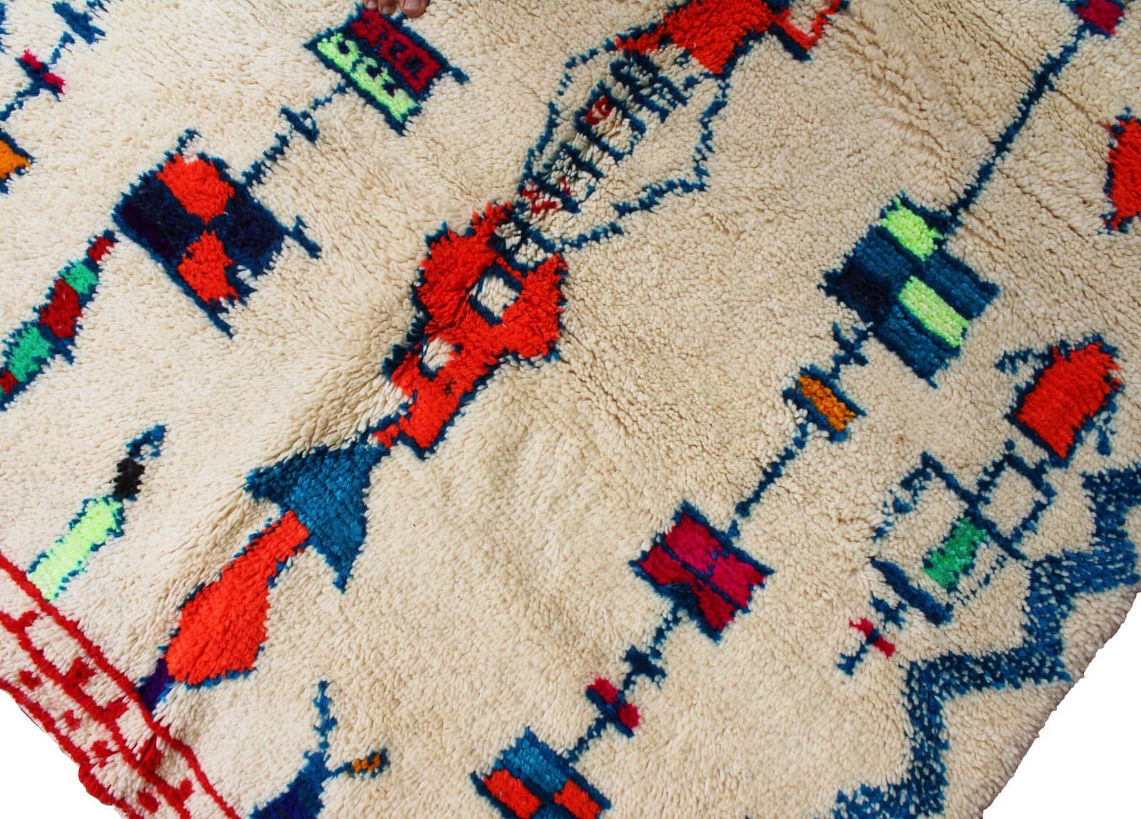 moroccan-wool-rug-cream-with-blue-pattern Cream tribal wool rug with colorful details top view