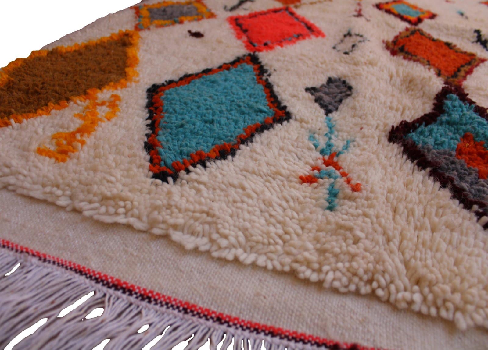 moroccan-wool-rug-geometric-pattern Thick wool Moroccan rug with traditional Atlas tribal symbols.