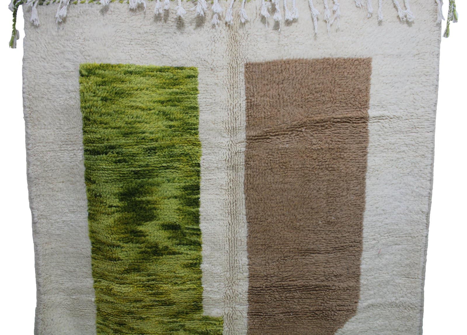 natural-dyed-wool-moroccan-rug Angled display of white Beni Ourain rug with green, brown, and yellow accents.
