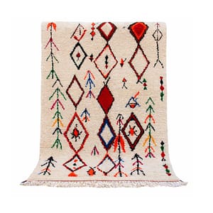 handmade-cream-moroccan-berber-rug Full view of handmade cream Moroccan Berber rug with colorful diamond patterns