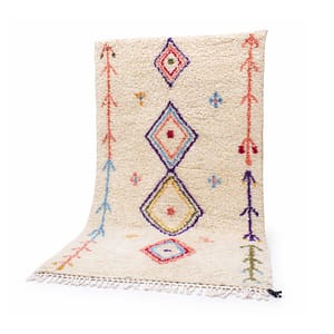 handmade-moroccan-berber-wool-rug-colorful-diamonds Full front view of handmade Moroccan Berber wool rug with colorful diamond motifs on an ivory background.