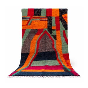 handmade-moroccan-berber-abstract-wool-rug Full front view of handmade Moroccan Berber rug with bold abstract geometric design in orange, red, green, and black.
