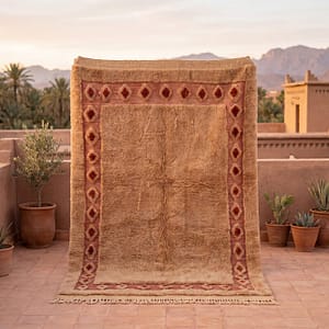 moroccan-tribal-rug-beige-red-geometric-pattern Handmade Moroccan Berber Rug | Plush Beige Wool Area Rug with Tribal Red Border | Boho Luxury Home Decor Carpet for Living Room & Bedroom