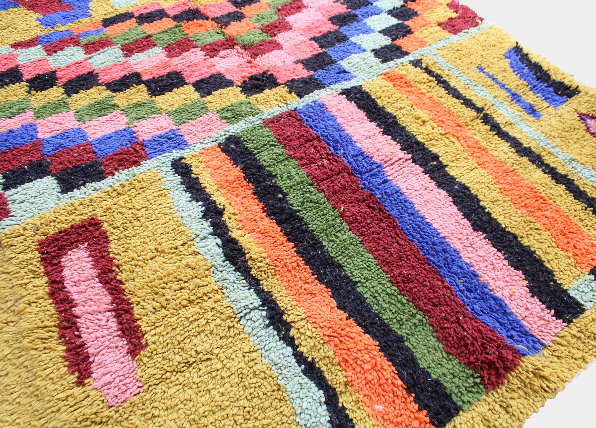 warm-yellow-moroccan-wool-area-rug Authentic Berber mustard wool rug from Atlas Mountains close up