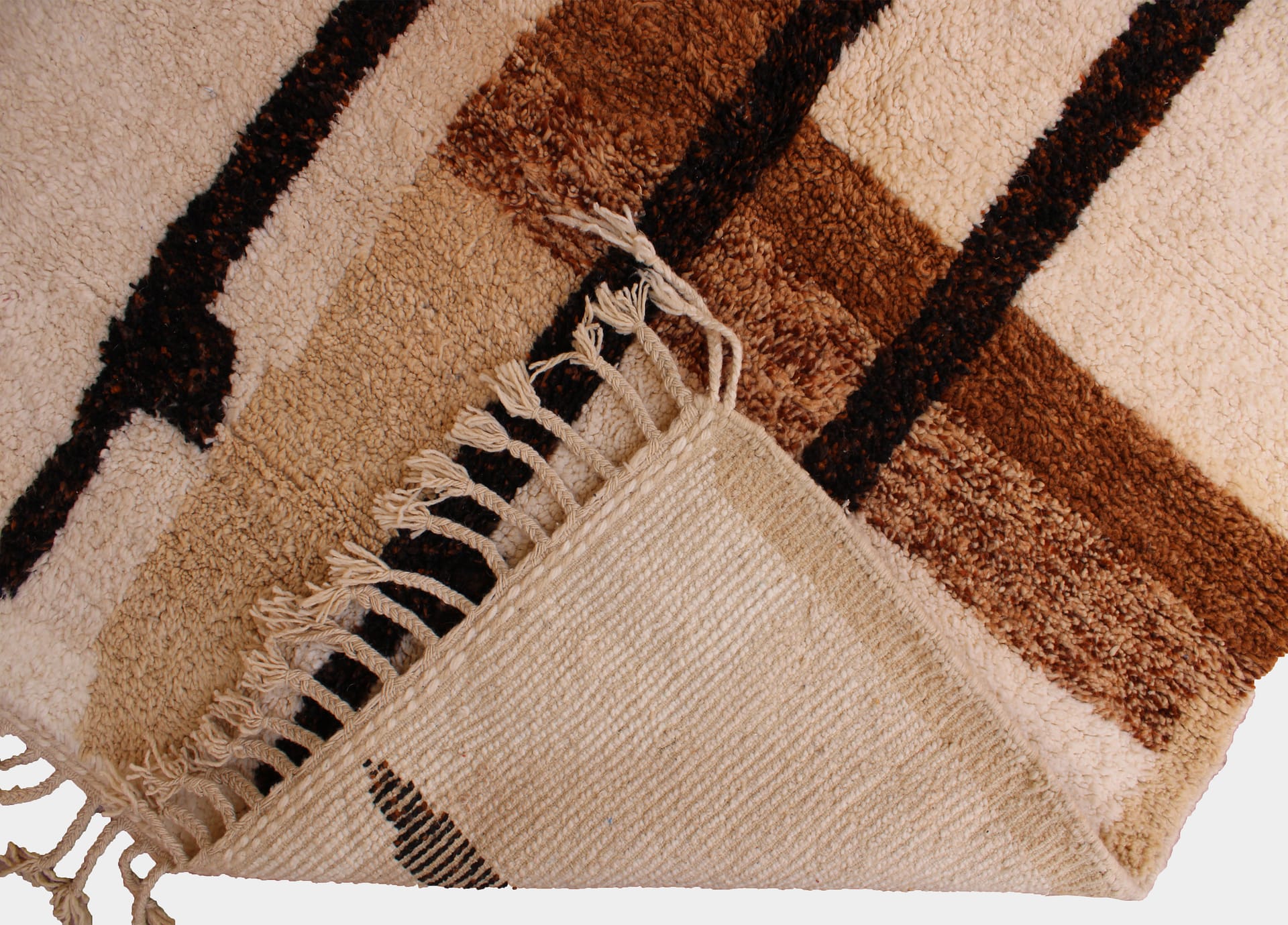 brown-tribal-berber-area-rug Brown handmade Moroccan area rug with tribal patterns texture detail