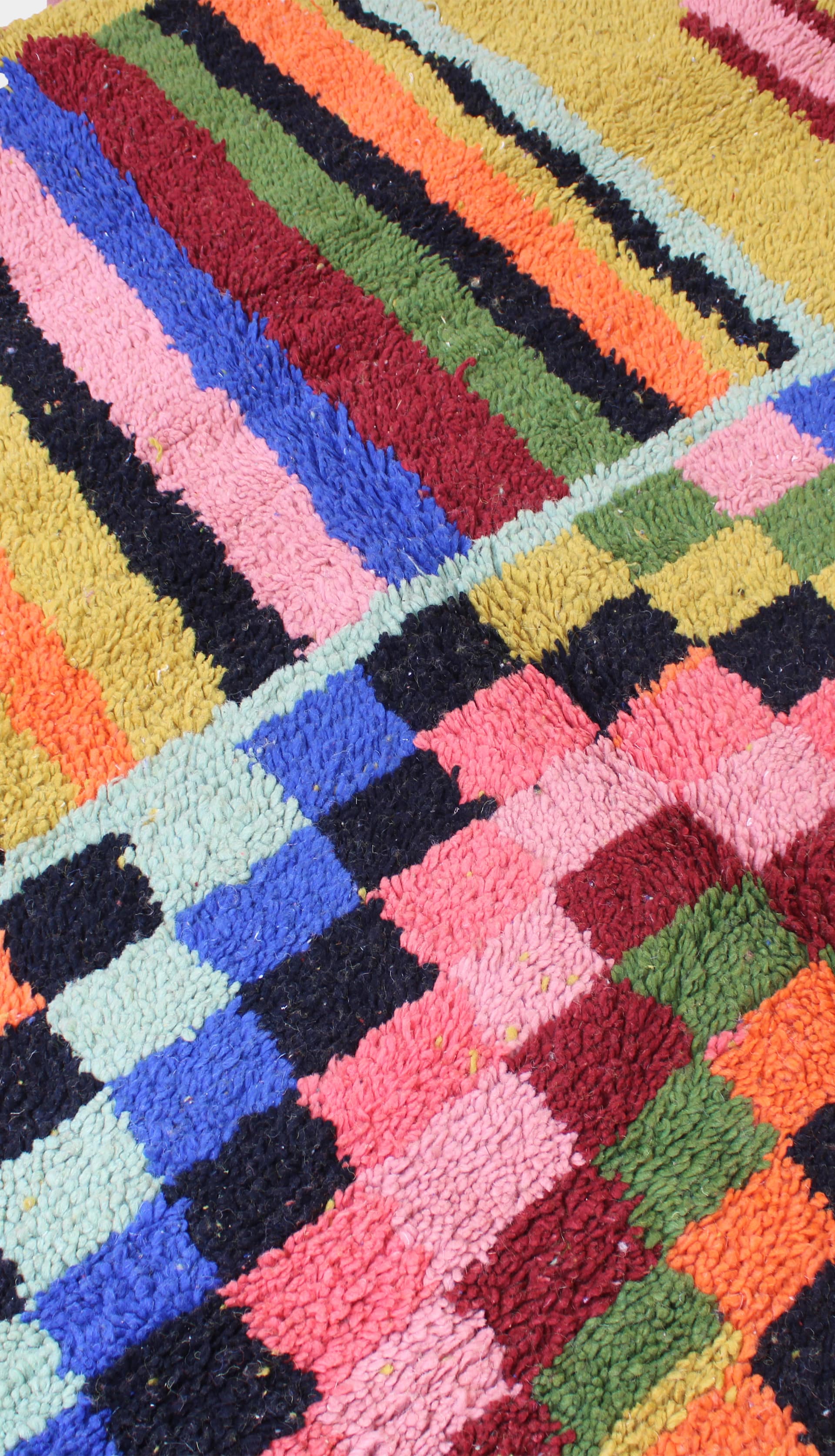 mustard-moroccan-beni-ourain-rug Yellow Moroccan wool rug close-up texture detail top view