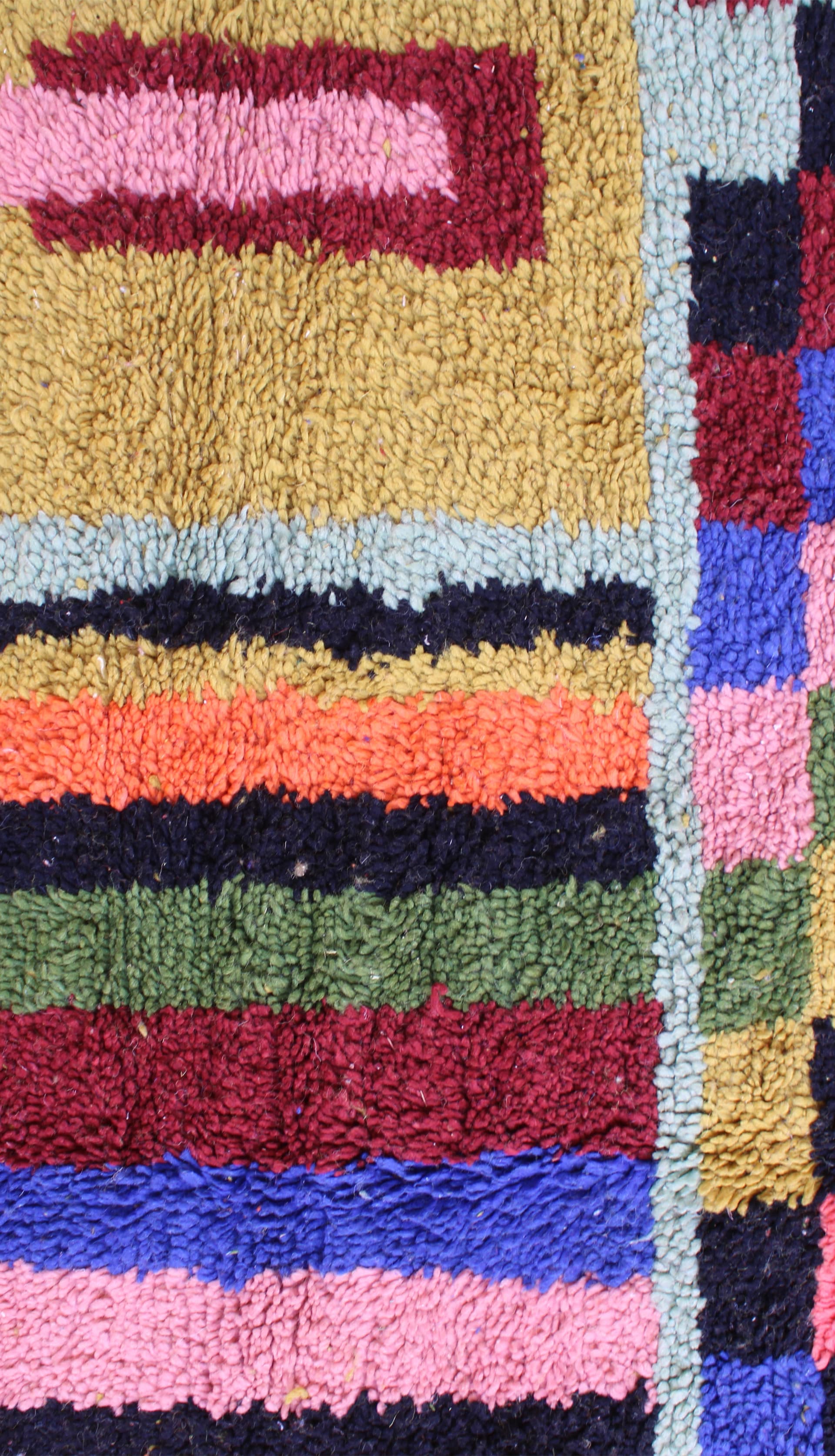 mustard-handwoven-moroccan-carpet Mustard Beni Ourain rug styled in modern interior top view
