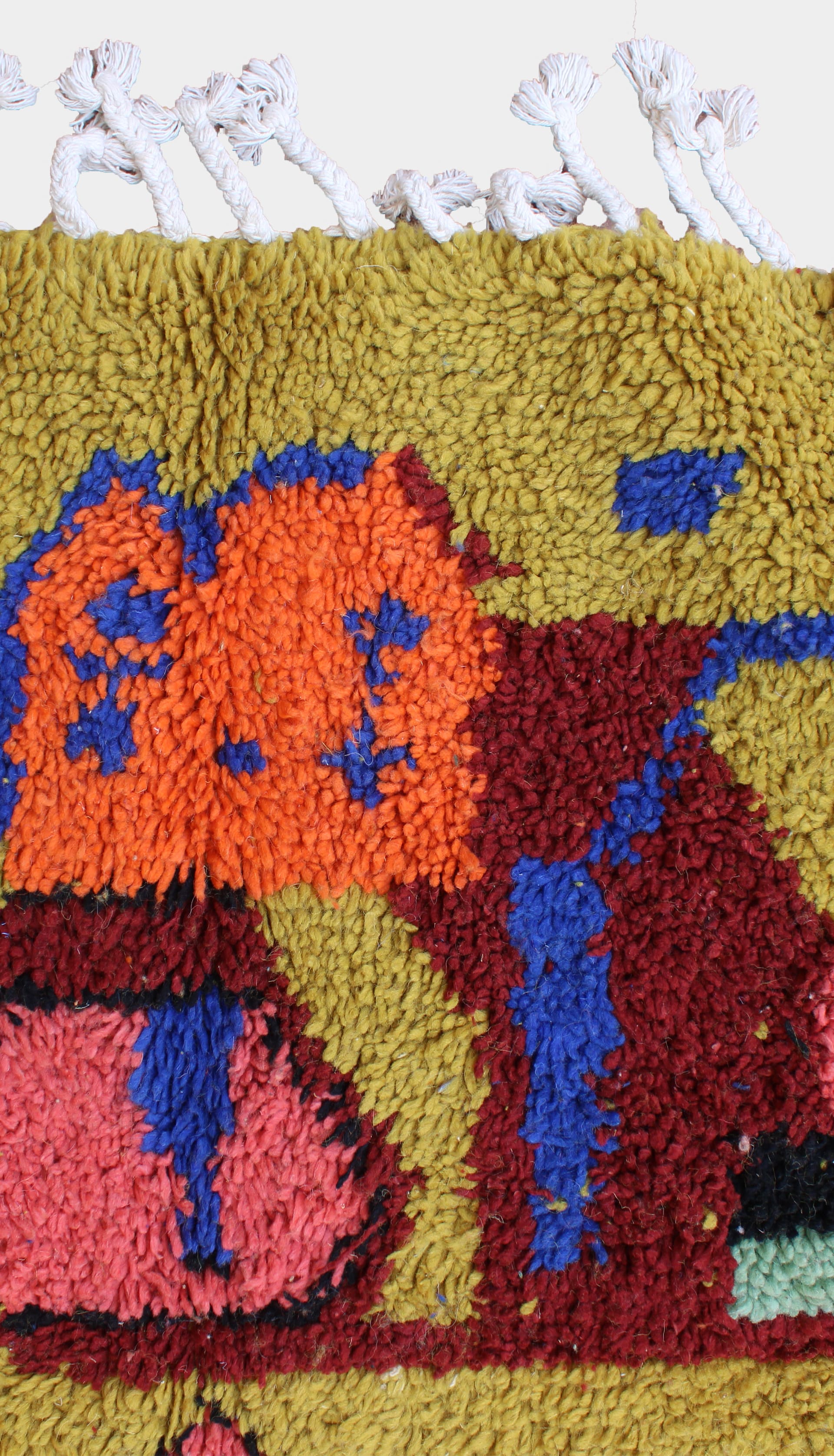 yellow-berber-moroccan-area-rug Warm yellow Moroccan wool rug for boho living room angled view